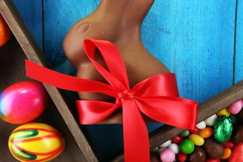 Chocolate Easter eggs and chocolate bunny and colorful sweets Stock Photos