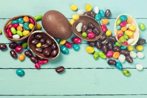 Chocolate Easter eggs and rabbit , on wooden background Foto stock