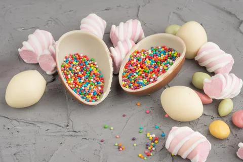 Chocolate easter eggs with a colored dragee. Macro Stock Photos