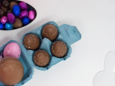 Chocolate Easter eggs in an egg carton Stock Photos
