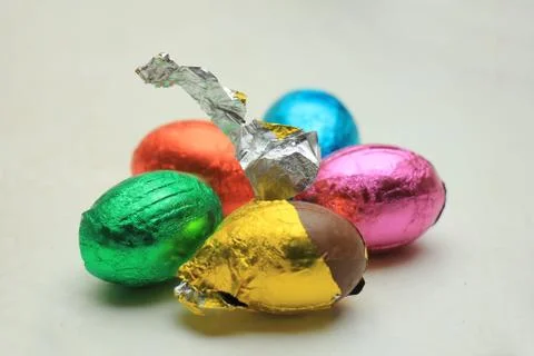 Chocolate easter eggs in metallic foil, various colors Stock Photos