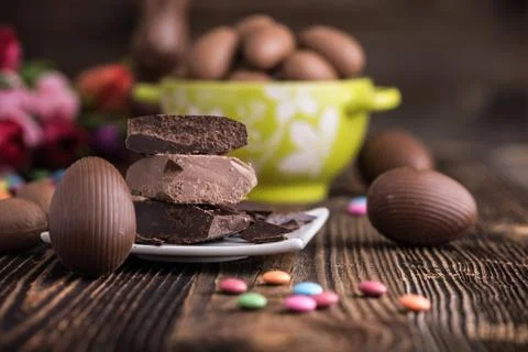 Chocolate Easter eggs with raw chocolate Stock Photos