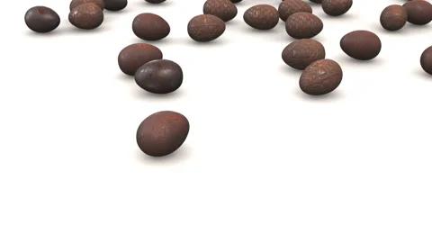 Chocolate easter eggs rolling down on slope Video stock 182343356