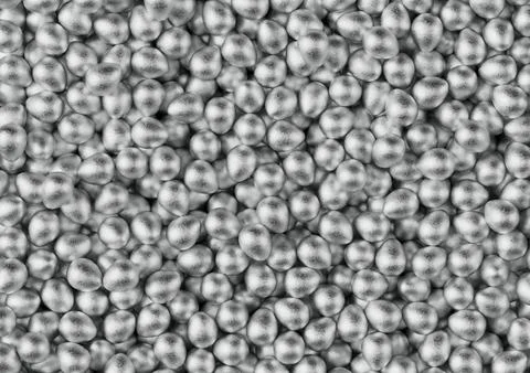 Chocolate easter eggs with silver Aluminium foil. Wallpaper. backdrop. Stock Photos