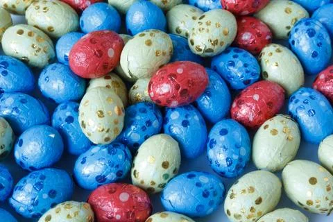 Chocolate easter eggs wrapped in tin foil Stock Photos