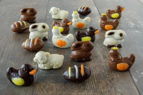 Chocolate easter figures: egg, bunny, duck, sheep, chicken Stock Photos