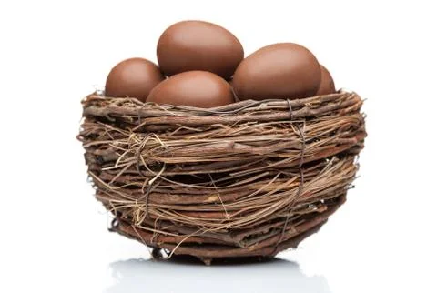 Chocolate Easter holiday eggs on white backround Stock Photos