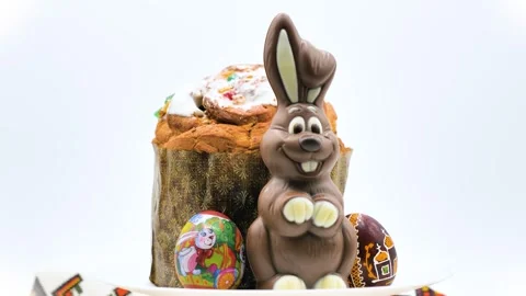 Chocolate Easter rabbit with cake and decorated eggs Stock Footage 276312950