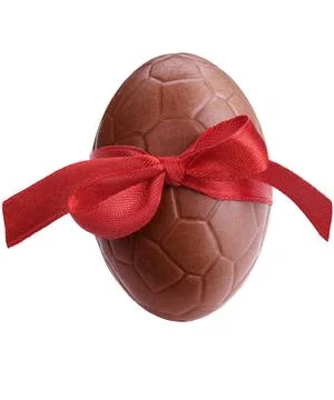 Chocolate egg Chocolate easter egg with a red ribbon isolated on white Cop... Stock Photos