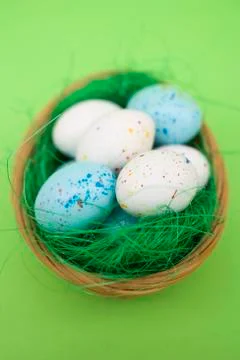 Chocolate eggs in Easter nest Stock Photos