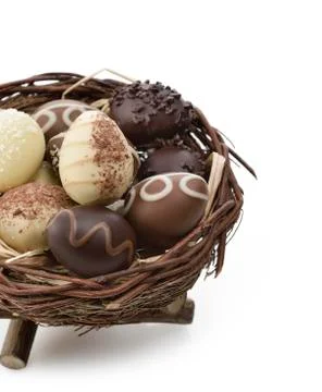Chocolate eggs in a nest Stock Photos