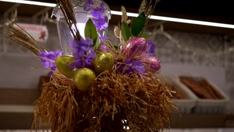 Chocolate eggs, Typical Italian sweets in Easter season. Panning 4K Video stock 331201869