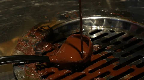 Chocolate flow. Close up of liquid hot chocolate in coffee shop, handheld shot 스톡 동영상 64046947