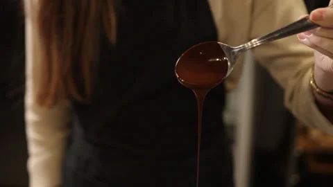 Chocolate flow, smooth chocolate, close-up Stock Footage 311989512