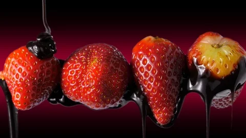 Chocolate flow on a Strawberries, dark background with red glow 스톡 동영상 86548487