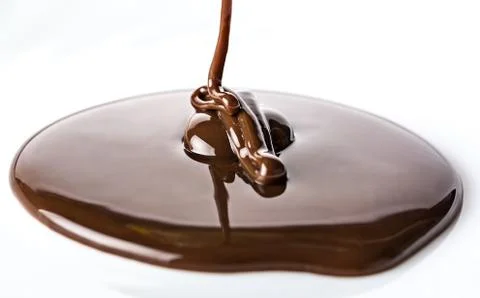 Chocolate flows Stock Photos