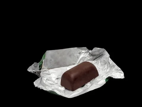 Chocolate in foil Stock Photos