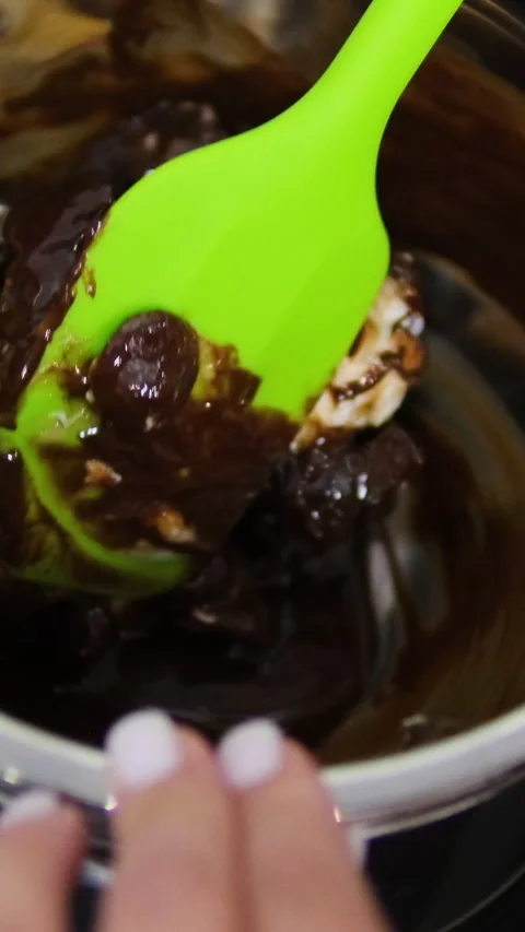 Chocolate fondant making process. Step by step mixing ingredients close up Stock Footage 280107084