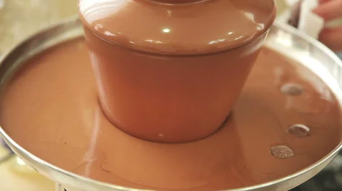 Chocolate fountain placed on a table Stock Footage 62485780