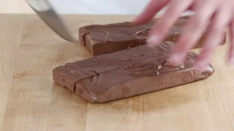 Chocolate fudge being diced Video stock 24672775