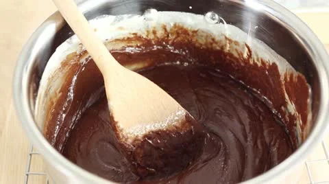 Chocolate fudge mixture in a pot Stock Footage 24672711