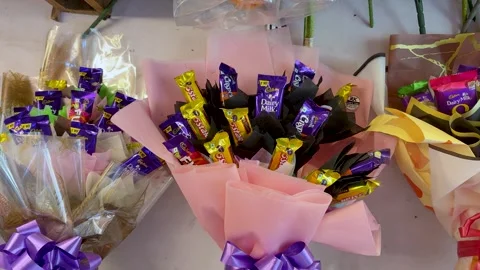 Chocolate Gift Bouquet Arrangement With Assorted Candy Bars For Special Stock Footage 340957694