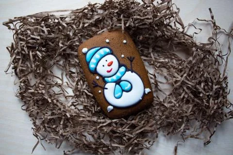 Chocolate gingerbread with a pattern in the form of a snowman Stock Photos