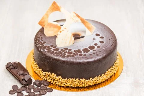 The chocolate glaze cake on the table Foto stock