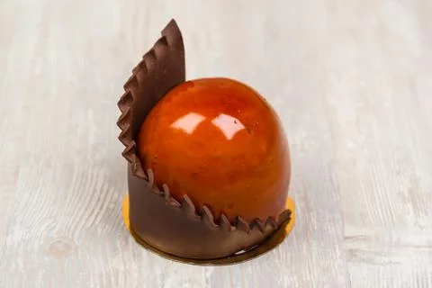 The chocolate glaze cake on the table Stock Photos