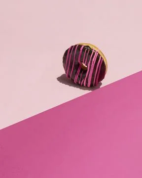 Chocolate Glazed Pink Donut Food Gravity Stock Photos