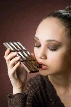 Chocolate gluttony. Stock Photos