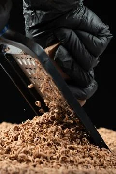 Chocolate grating process, chocolate chips Stock Photos