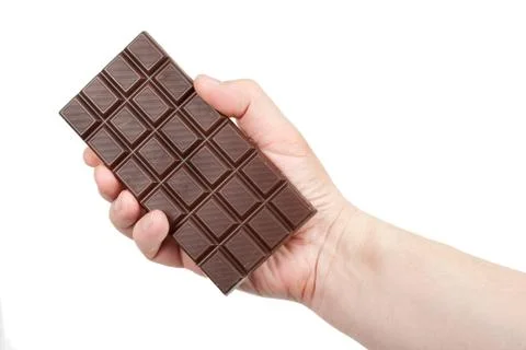Chocolate in hand Stock Photos