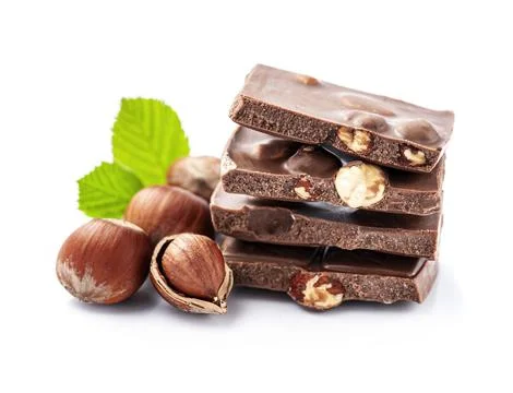 Chocolate with hazelnuts nuts on white backgrounds Stock Photos