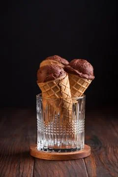Chocolate Ice Cream Cones on Dark Wooden Background 스톡 사진