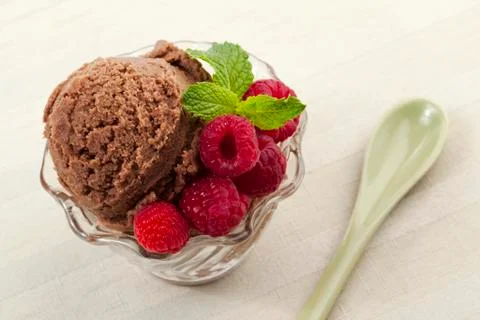 Chocolate ice cream with raspberry Stock Photos