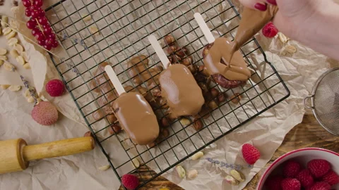 Chocolate icing on cake. Topping chocolate dessert. Stock Footage 168804310