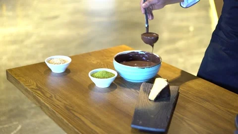 Chocolate icing on a slice of cake Stock Footage 167588227