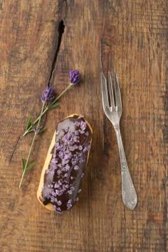 Chocolate lavender eclair Stock Photos