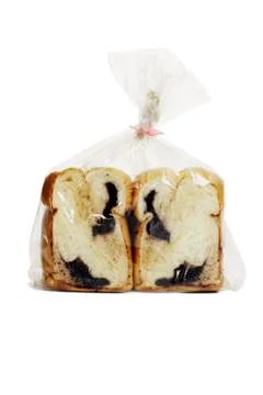 Chocolate loaded bread in plastic bag Stock Photos