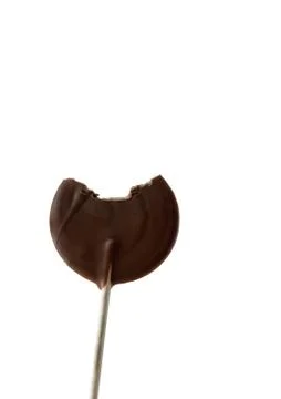 Chocolate lollipop with bite missing Stock Photos