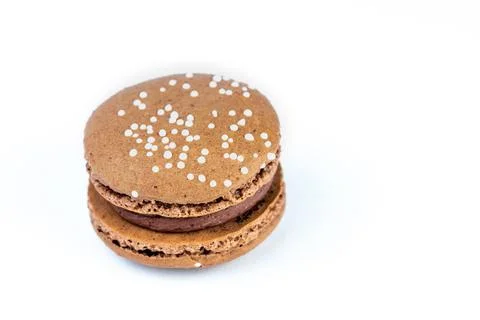Chocolate macron on a white background Stock Photos