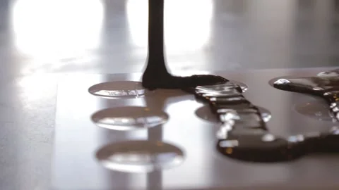 Chocolate making phase luquid chocolate Stock Footage 229718280