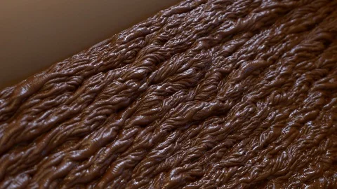 The chocolate making process using the refiner extruder. Stock Footage 100645106