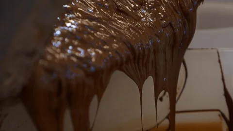 The chocolate making process using the refiner extruder. Stock Footage 100645316