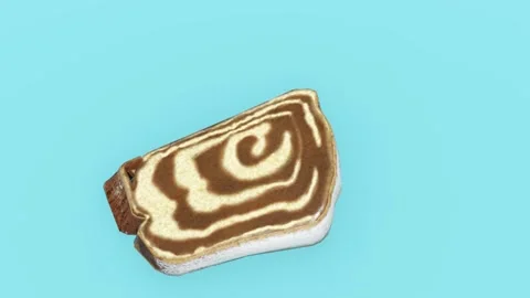 Chocolate Marble Bread Slice on Blue Surface Video stock 319883339