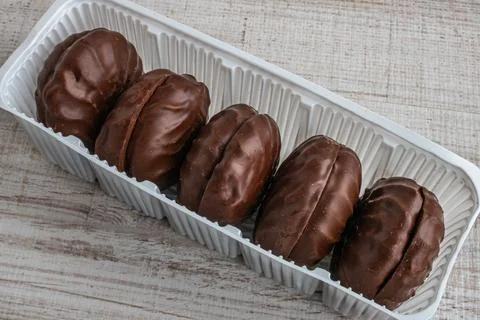 Chocolate marshmallows in a package. A box of marshmallows in chocolate gla.. Stock-Fotos