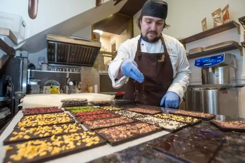 Chocolate master preparing handmade chocolate bars Stock Photos
