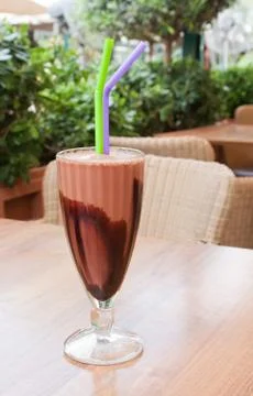 Chocolate milkshake on table Stock Photos