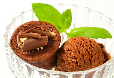 Chocolate mousse with mint leaf garnish Stock Photos